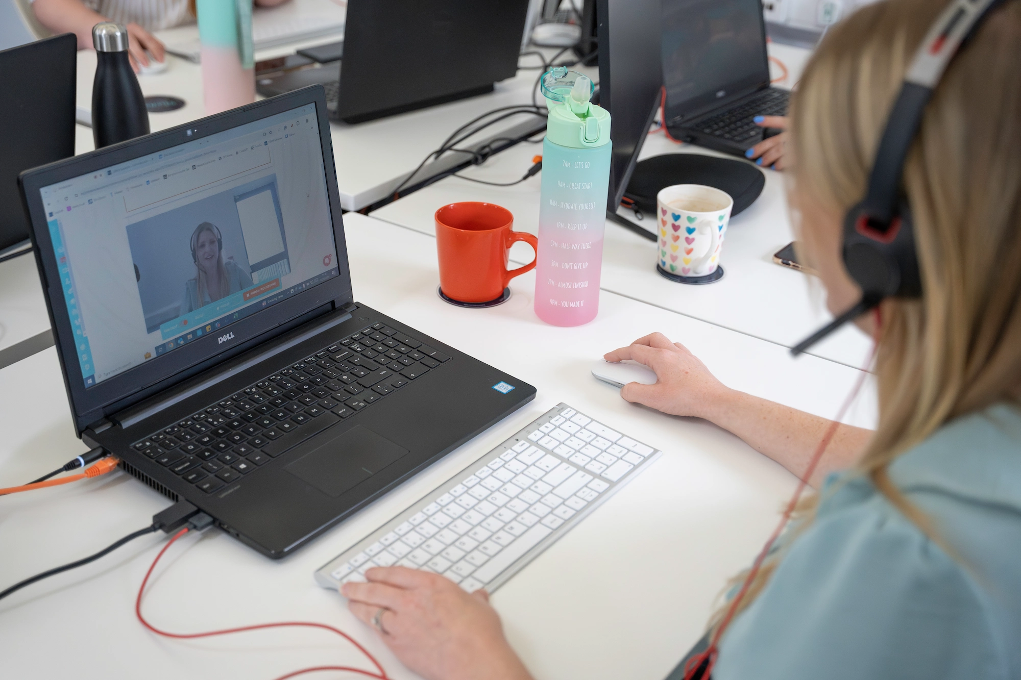 Karen editing a video interview.